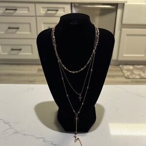 Elegant Gold Layered Necklace with Cross Pendant
